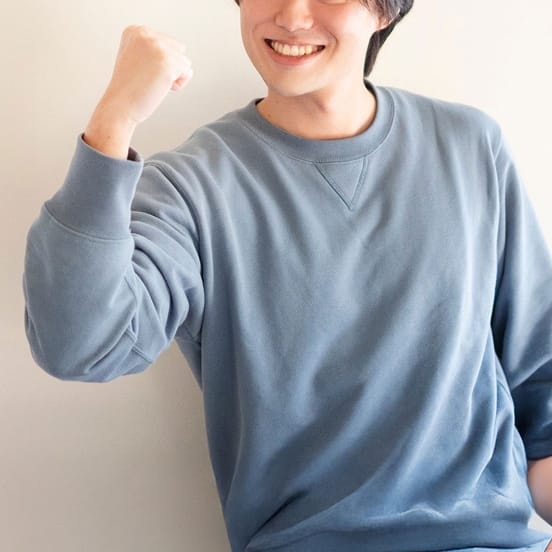 ドライバーとして働く田中優さん